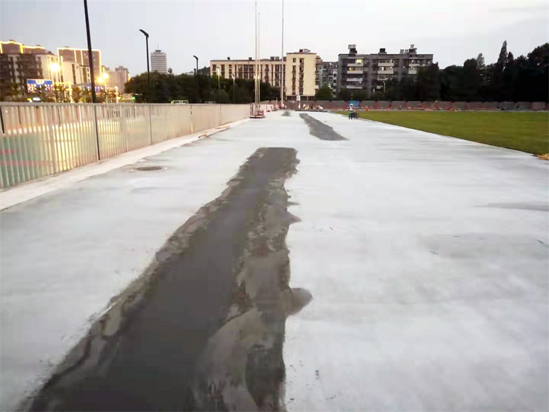 instalación de pista de atletismo